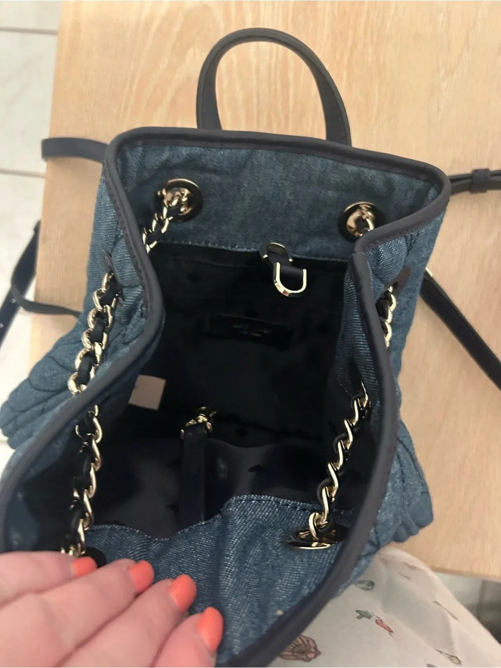 kate spade Quilted Denim Drawstring Backpack with Navy Trim